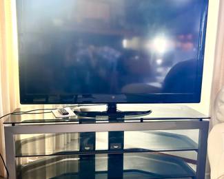 TV and glass TV stand