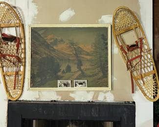 These are vintage snowshoes alongside an interesting mountain print. All you see is the unpainted drywall. Us too… but we don’t have time. Do we have time to paint? No, no we don’t, we aren’t realtors.