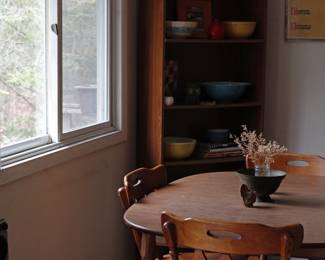 This quaint kitchen and 70’s vibe holds so much vintage- imagine the meals at this table!