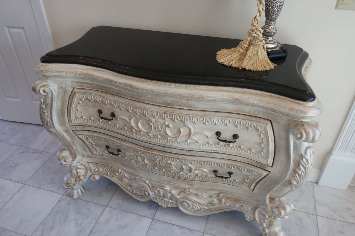 *        Bombay style chest with  marble top.  Size  is  48"  x  20".  Price  is  495.00