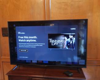 Vizio  television. It  is  55"  wide.