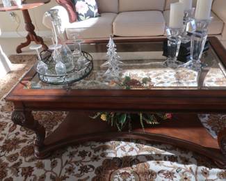 large  glass top coffee  table.  it  has  a  beveled  edge and  is  54 x  34.  Price  is 395.00.