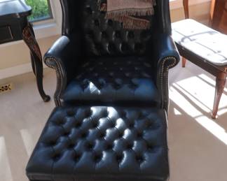 Blue  leather  chair with  hassock  (as  shown)