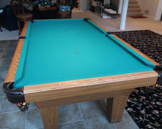 *    Table Size  is  4'  x 7' 8"    Pool  cues  and balls  are  included.  Table  price  is  500.00.