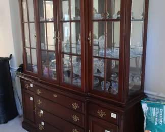 *    Stanley china  cabinet.  It  is 69 1/2" wide  and  18"  deep.    