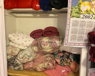 Pillow tests at top Of closet - more linens 
