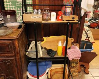 Kitchen  items including pig cutting board, mustard ketchup set, lids, salt & pepper sets 