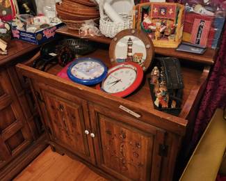 Great buffet piece in good condition - storage at bottom with clocks, baskets & decor items. 