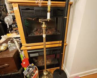 Two heaters (stacked) with magazines & stand lamps 