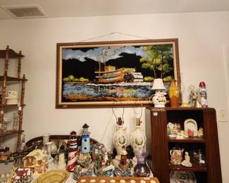 Top of chest items & items inside cabinet - large framed picture above on wall