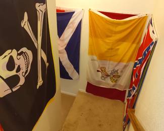 Flags decorate the entrance to the man cave. And what a cave of wonders it is.
