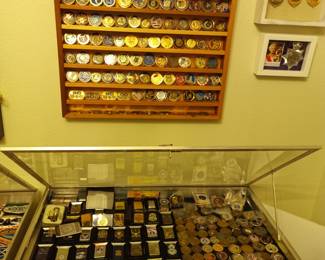 Dozens of zippo lighters and challenge coins