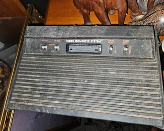 We found a box full of old Atari 2600 with 10 games and two sets of controllers it is an early edition serial number 033. Which means it was manufactured March of '83. $100 for everything