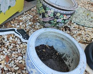 We have two ceramic planters. $30 each or both for $50