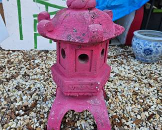 We have about five concrete pagodas for sale this one here is $75. We have other large ones for $100