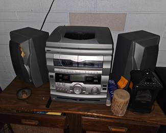 Older 1990s bookshelf stereo, record player works, cassette players work as well as the stereo receiver the CD player does not $50