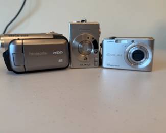 Digital Cameras  (Panasonic SDR H-40 Video Camcorder, Canon ELPH2, Casio Exilim) - Sold Separately.