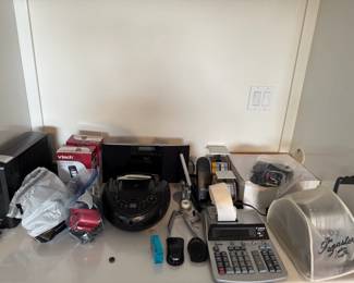 Cyber Power 1500 AV/AVR UPS Backup Mini-Tower, Vtech Cordless Phones,  CD Player, Panasonic Compact Stereo System, Scales, Calculator, Paymaster Ribbon Writer and Signer.