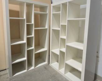 Two White Modular Shelving Units