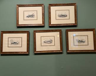 Lots of hunting and fishing related artwork