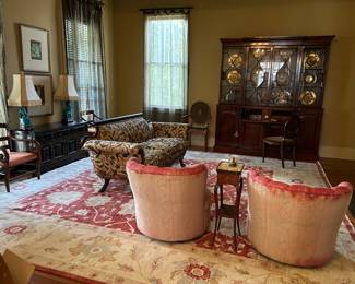 Pair of  contemporary  barrel swivel chairs, large attractive rug, beautiful Chippendale bookcase/desk, oriental cabinet, LAMPS not in sale. 