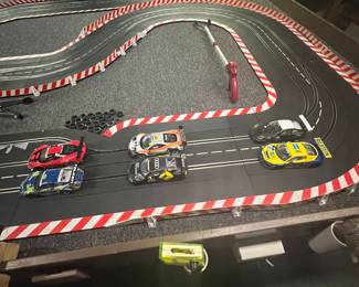  Slot Car Collection $1750.00                                                                                 Track, 20 slot cars, hand controls, Audio and visual, and racing software with 3 TV screens.