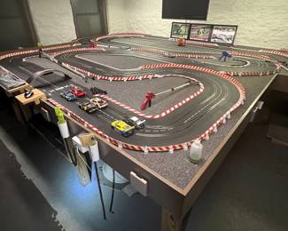  Slot Car Collection $1750.00                                                                                 Track, 20 slot cars, hand controls, Audio and visual, and racing software with 3 TV screens.