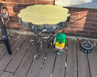 Round metal outdoor table, $25