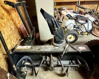 Snow Throwing Attachment…goes with the Tractor!