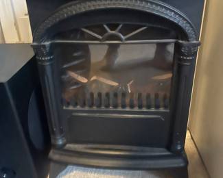 Freestanding electric fireplace