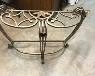 Beautiful Metal and Glass Table. Half circle design. Glass top is included (not pictured). 47"L 18"W 30"H.