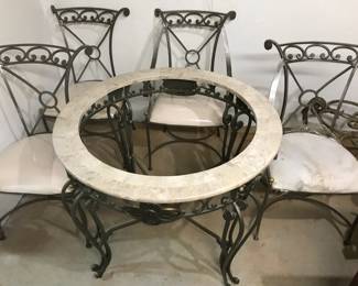 Marble Kitchen Table w/ 4 Chairs. Glass top is included but not shown in picture. One seat cover is damaged (see pics). 38" Diameter 31" Height.