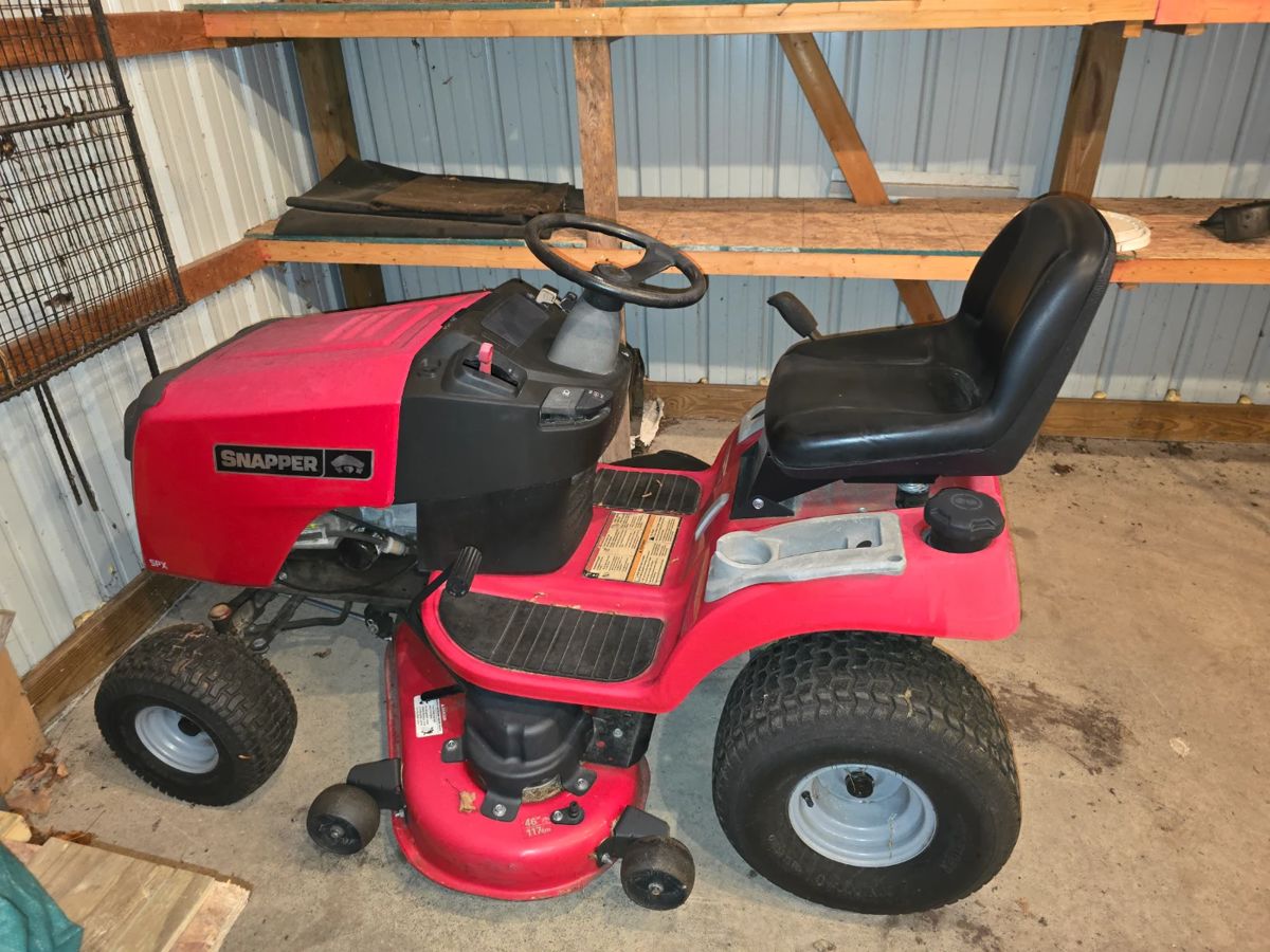 Snapper Mower, about 5 years old, runs great.  There is a second Snapper Mower (not pictured) that is older, runs great and has a leaf collector attached.