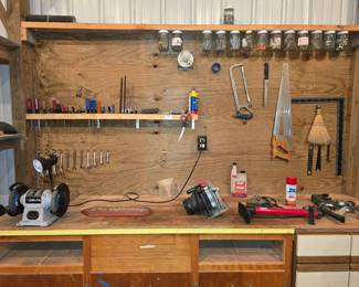 2nd work bench, a few more hand and power tools.  Hardware, 