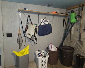 The wood frame fishing net on the far left is a collector's piece.