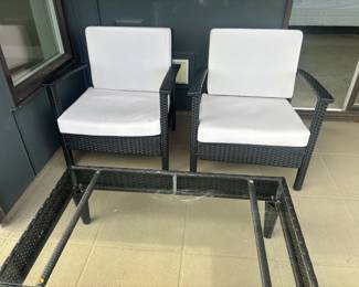  4-Piece Black Poly Rattan Patio Furniture Set with White Cushions