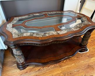 Matching coffee table in with glass inserts 