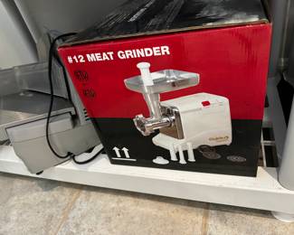#12 Meat Grunder.  Grinds up to 4.4 pounds a minute. 