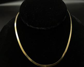 Brightly Polished Classic Herringbone Chain Necklace in 14k Yellow Gold