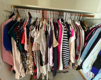 On of three closet that will be completely full of jackets, tops, dresses and more