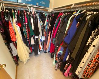 On of three closet that will be completely full of jackets, tops, dresses and more