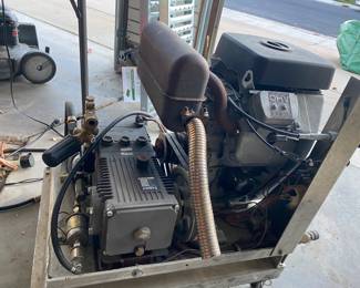 Industrial strength power washer, Hoses and washer wands included. 