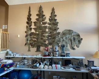 Large metal forest scene with bear wall decor. From an artist in Breckenridge by the last name Goda