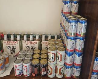 Lots of unopened Vintage beer cans