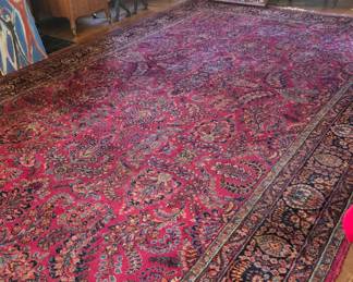 SMALL ROUND TABLE NEXT TO VICTROLA STAYS WITH HOME