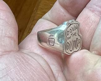 Very interesting custom made sterling ring here… never seen anything like it, but certainly felt that way sometimes. Now there’s a ring to tell the world to leave you alone… you’r dealing with some trash.