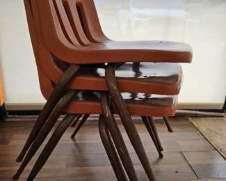 (3) Stackable Orange Chairs