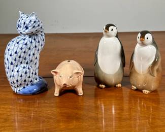 (4pc) CERAMIC ANIMALS | Including: pair of penguins marked on bottom “Made in Russia”, ceramic pig coin bank, and Herend style ceramic cat. -  h. 7.5 x w. 3 x l. 4 in
