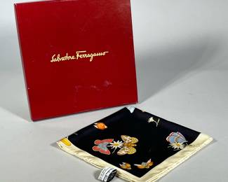 SALVATORE FERRAGAMO SILK SCARF | In original box, made in Italy, decorated with flowers and insects on a black ground within a cream border. -  w. 9.5 x l. 9.5 in (box)