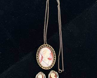 CAMEO JEWELRY | Including: carved Cameo pendant/brooch with mixed metal chain, and pair of cameo clip-on earrings. - w. 1.5 x l. 2 in (cameo brooch)